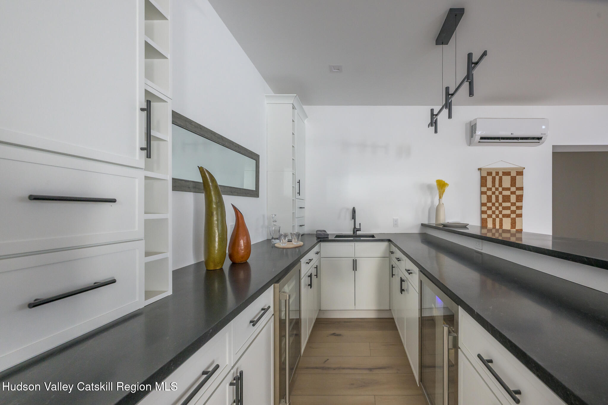 305 Mitchell Hollow Road Windham, NY 12496 - Photo 27 of 39 a kitchen with a sink and refrigerator