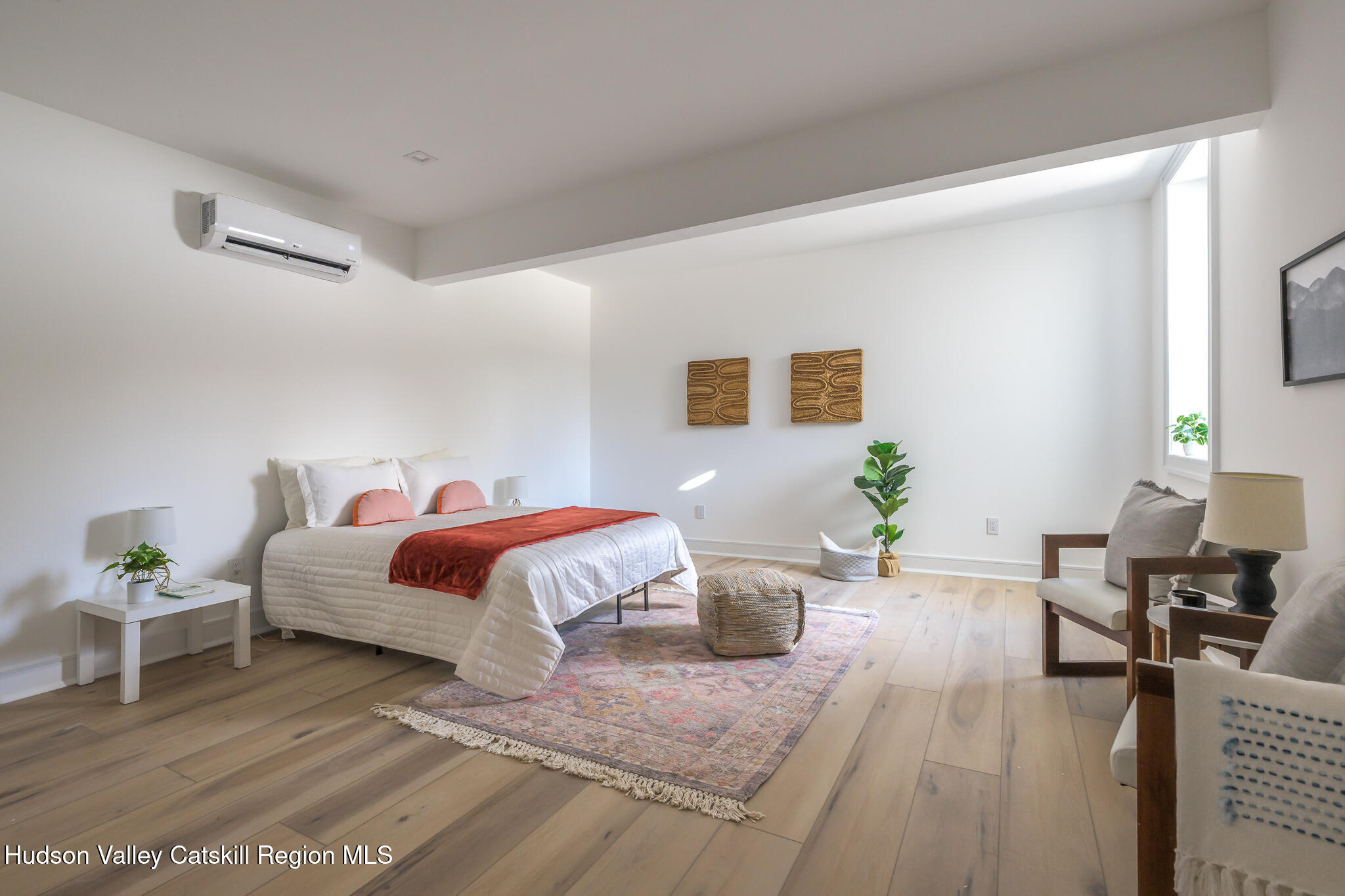 305 Mitchell Hollow Road Windham, NY 12496 - Photo 29 of 39 a living room with furniture and wooden floor