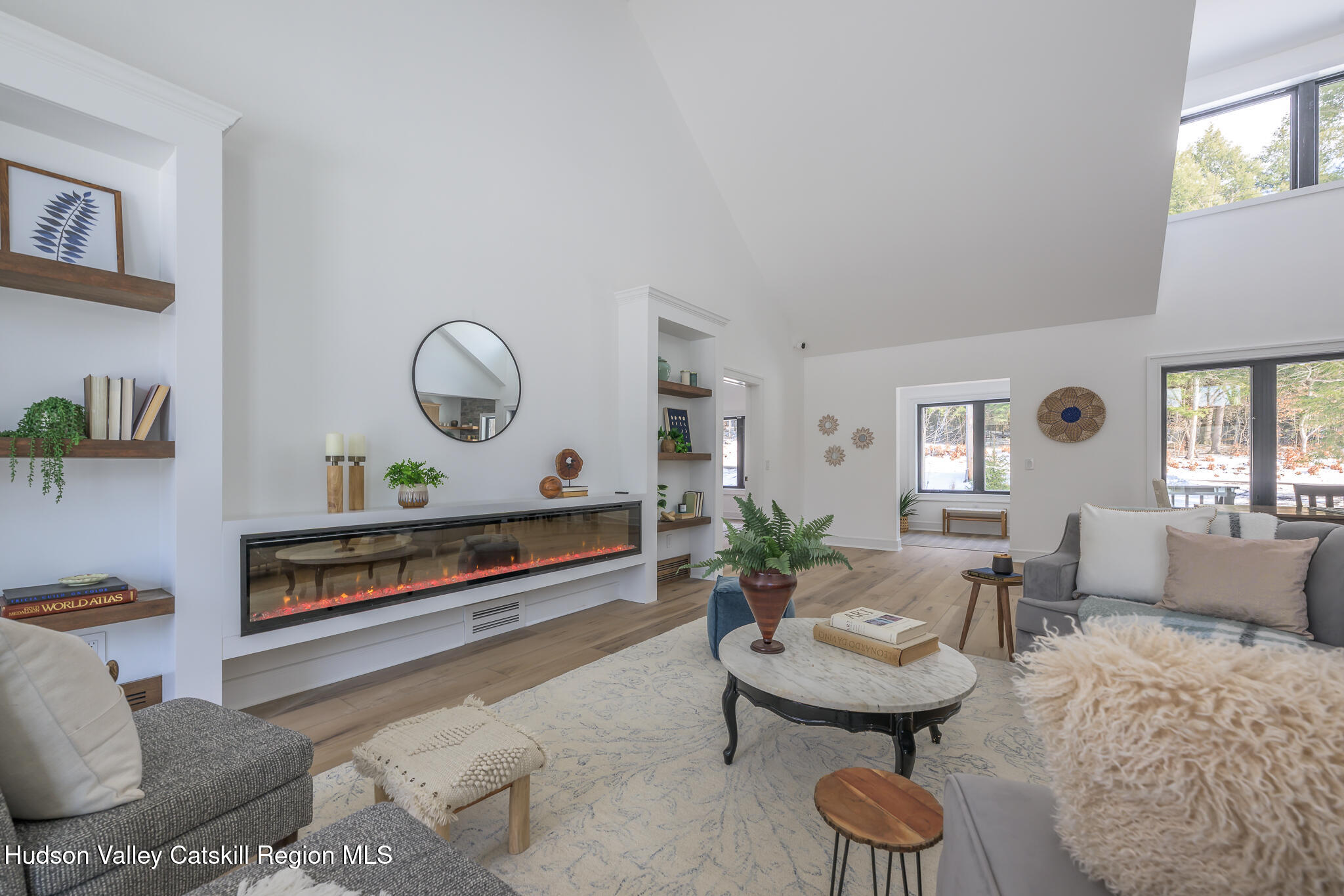 305 Mitchell Hollow Road Windham, NY 12496 - Photo 7 of 39 a living room with furniture and a potted plant