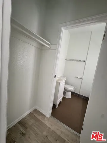 a view of an empty walk in closet