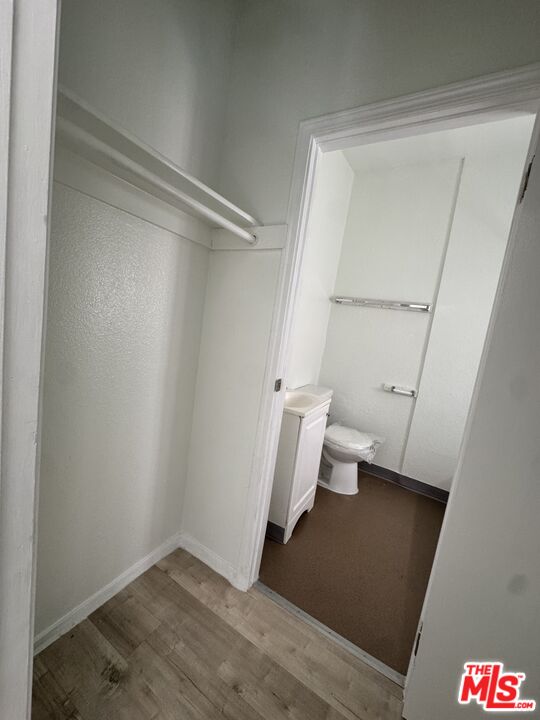 3051 Leeward Avenue, Unit 311 Los Angeles, CA 90005 - Photo 6 of 8 a view of an empty walk in closet