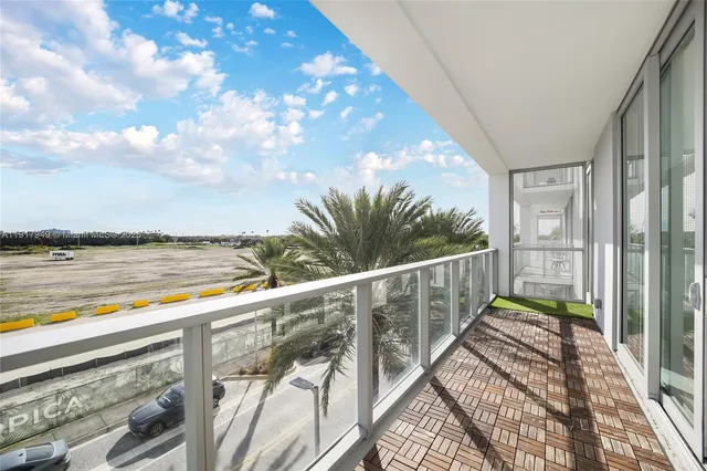 a view of balcony with furniture
