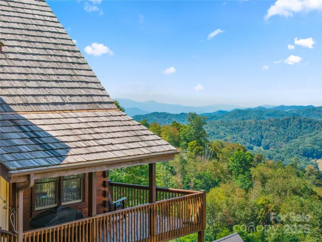 a view of a balcony with an outdoor space