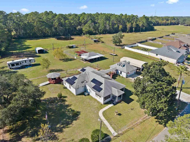 a view of a terrace with furniture