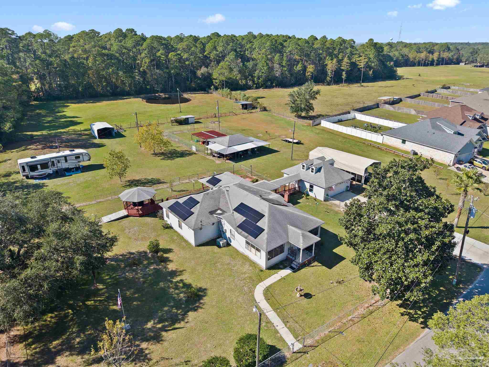 3319 Bob Tolbert Road Navarre, FL 32566 - Photo 42 of 51 an aerial view of a house with outdoor space