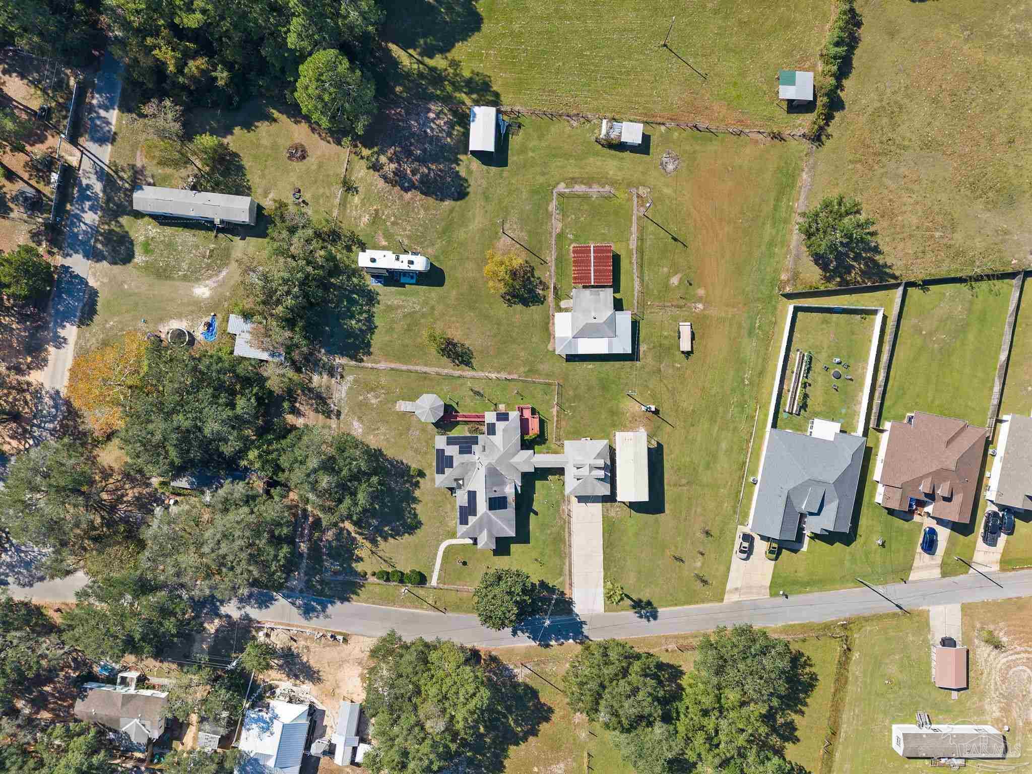 3319 Bob Tolbert Road Navarre, FL 32566 - Photo 45 of 51 an aerial view of residential houses with outdoor space
