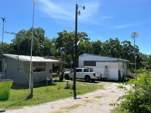 a car parked in front of a house