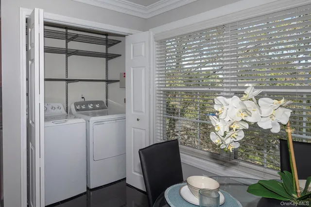 a bathroom with a toilet and a shower curtain