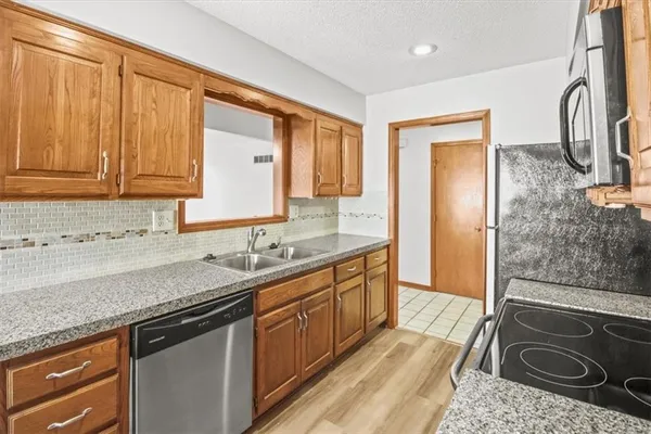 $315,000 | 213 Southeast Ridgeview Drive, Lee's Summit, MO 64063