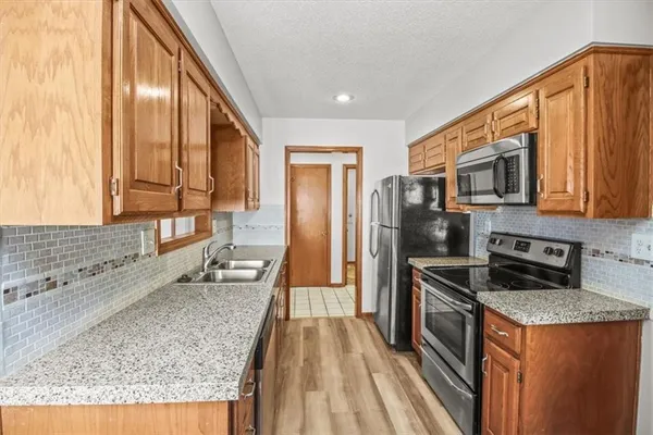 $315,000 | 213 Southeast Ridgeview Drive, Lee's Summit, MO 64063