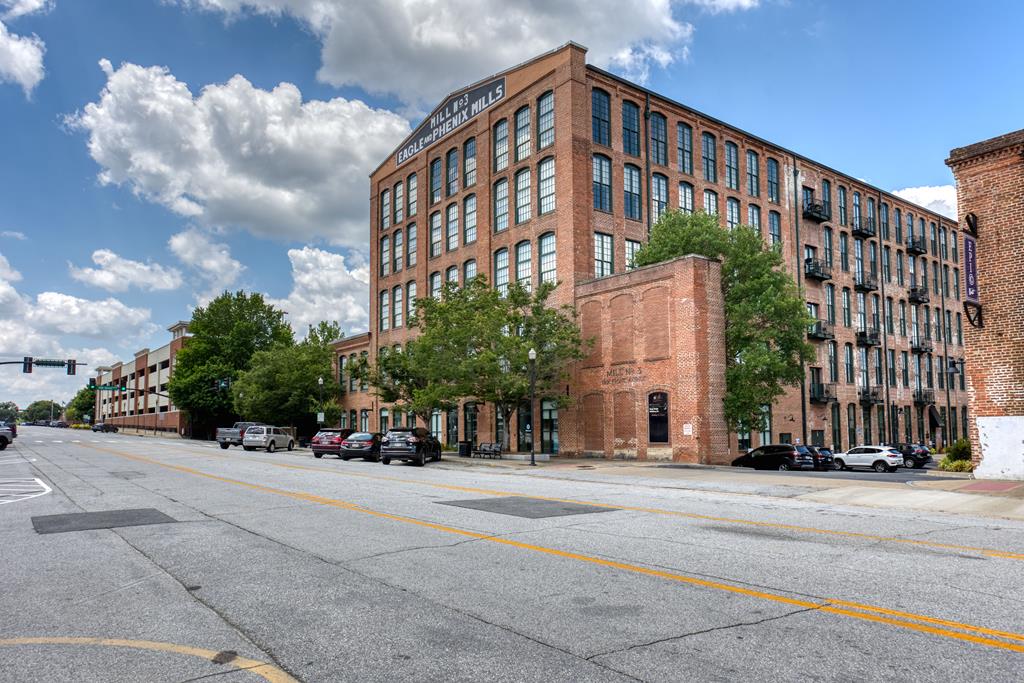 a view of a building with a street