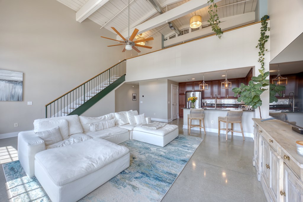 1201 Front Avenue, Unit 522 Columbus, GA 31901 - Photo 20 of 56 a living room with furniture and a ceiling fan