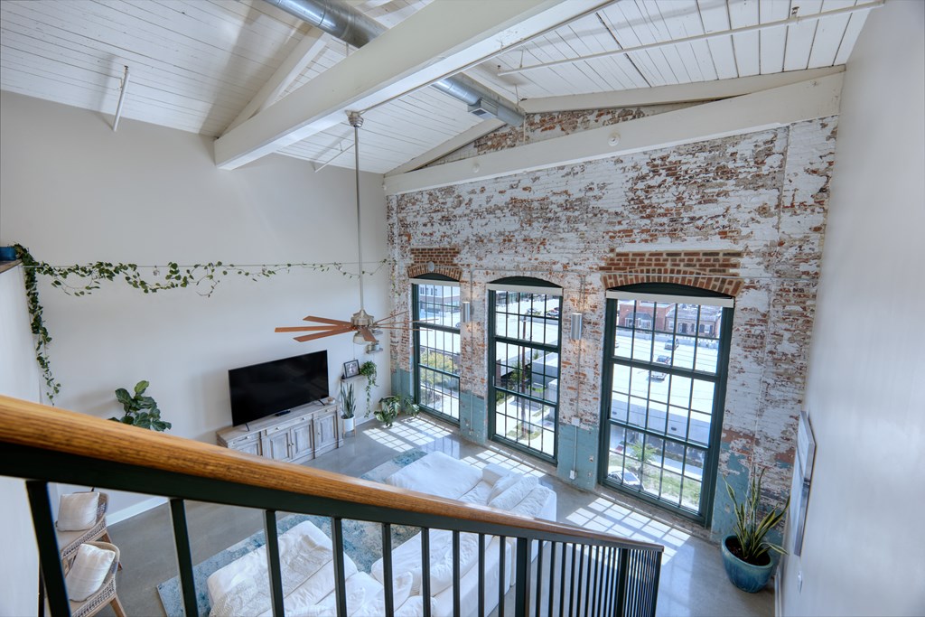 1201 Front Avenue, Unit 522 Columbus, GA 31901 - Photo 22 of 56 a view of a porch and a fireplace in livingroom