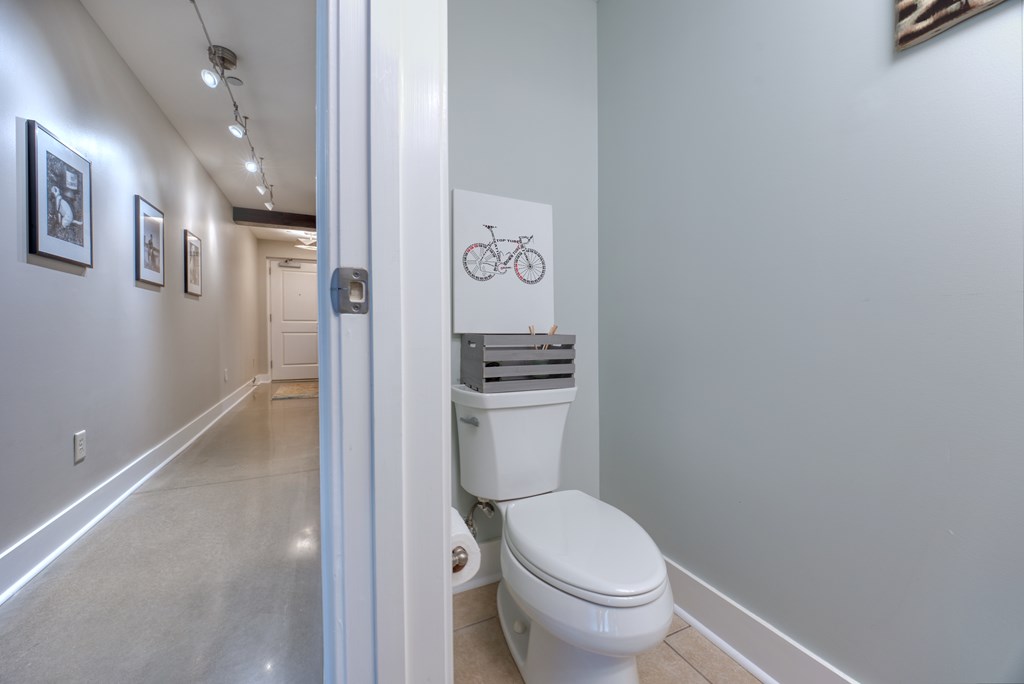 1201 Front Avenue, Unit 522 Columbus, GA 31901 - Photo 29 of 56 a bathroom with a toilet