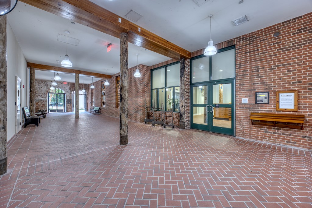 1201 Front Avenue, Unit 522 Columbus, GA 31901 - Photo 3 of 56 a view of a lobby with black carpet