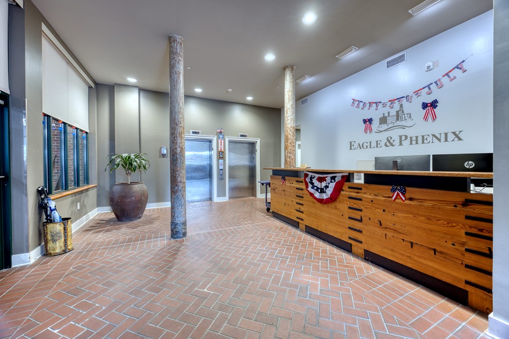 1201 Front Avenue, Unit 522 Columbus, GA 31901 - Photo 4 of 56 a view of a hallway with an entryway