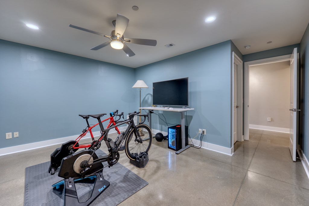 1201 Front Avenue, Unit 522 Columbus, GA 31901 - Photo 45 of 56 a view of a livingroom with furniture and gym equipment