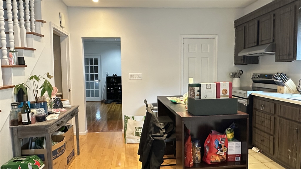 46-48 Buckley Street Quincy, MA 02169 - Photo 13 of 42 a view of a kitchen with furniture and a kitchen