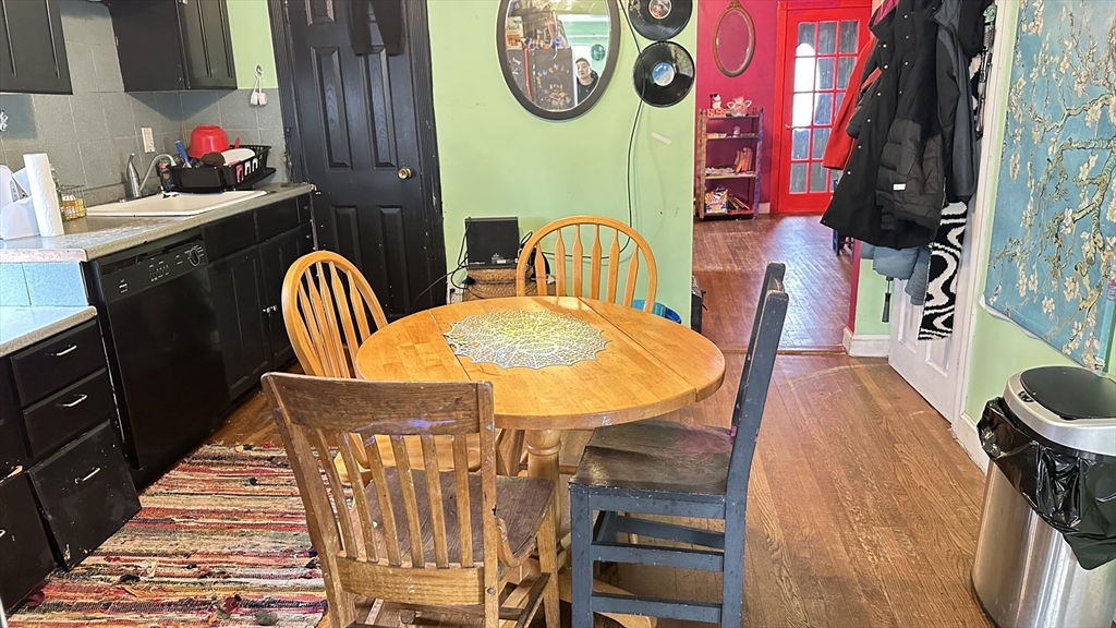 46-48 Buckley Street Quincy, MA 02169 - Photo 31 of 42 a view of a dinning room with furniture and wooden floor
