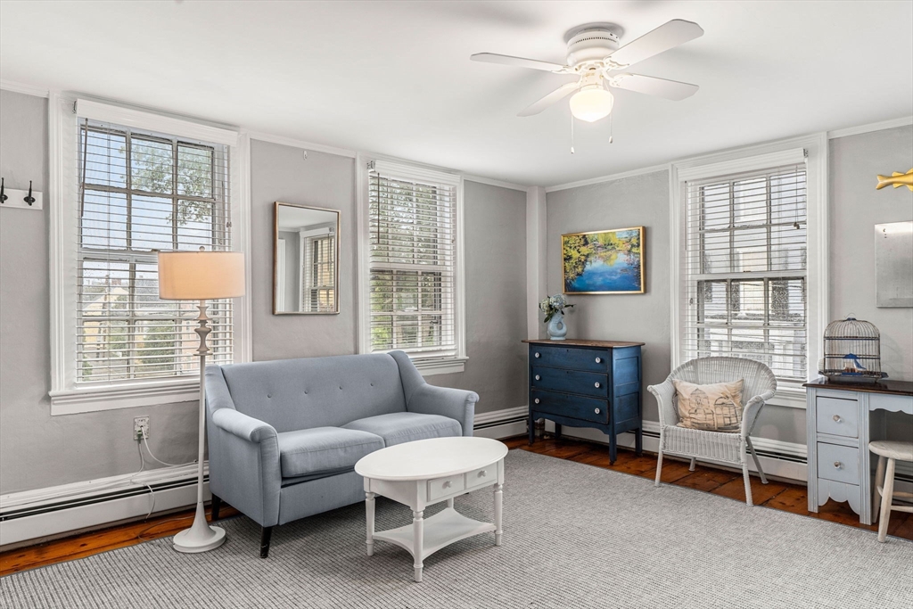 45 Washington Street, Unit 3 Marblehead, MA 01945 - Photo 8 of 24 a living room with furniture and a window