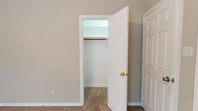 a view of an entryway with hallway