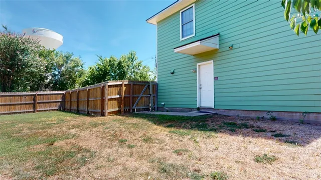 a view of a yard with plants