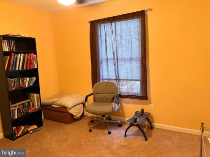 a view of livingroom with furniture and staircase