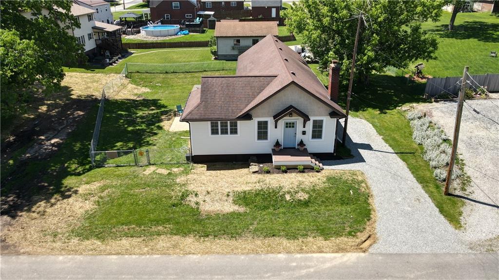 113 3rd Street Houston, PA 15342 - Photo 1 of 27 a view of a house with a yard