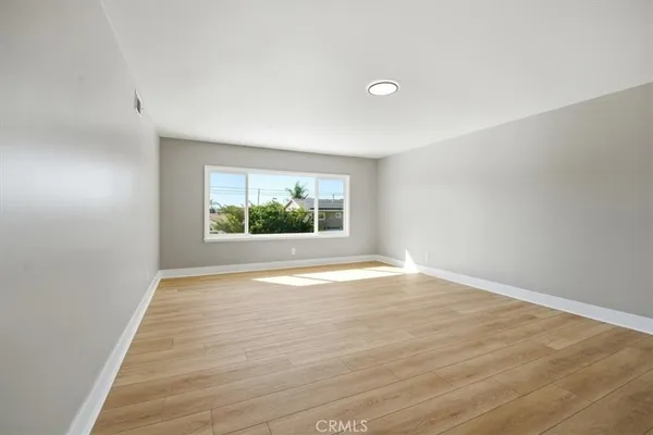 a bathroom with a double vanity sink mirror and shower