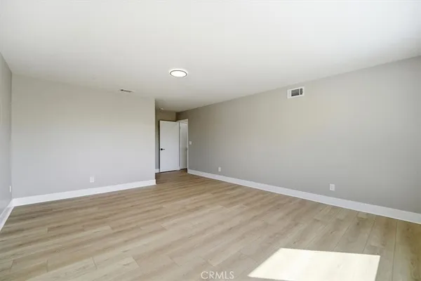 a bathroom with a shower sink and mirror
