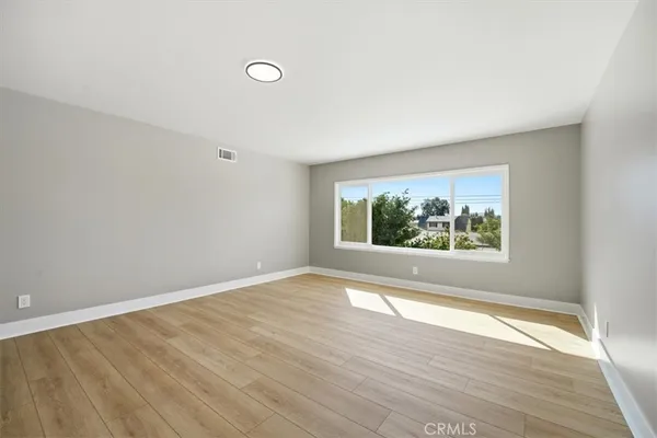 a bathroom with a shower and a toilet