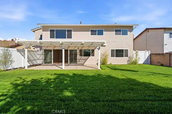 a front view of house with yard and porch