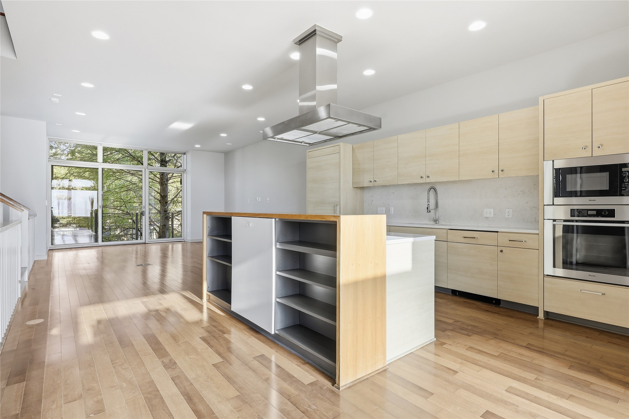 3507 Harmon Avenue Austin, TX 78705 - Photo 8 of 36 a kitchen with stainless steel appliances a stove a refrigerator and a sink