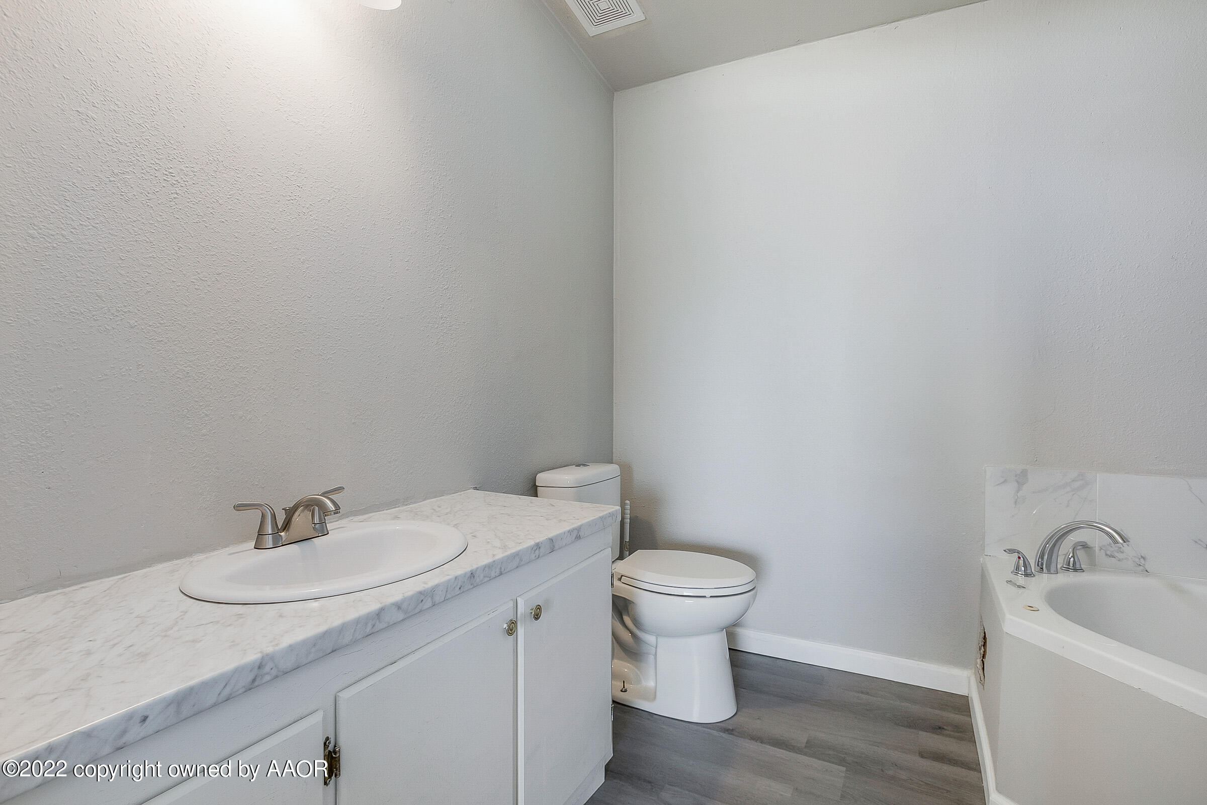 3501 Silver Hill Circle Amarillo, TX 79108 - Photo 15 of 25 a bathroom with a sink and a toilet