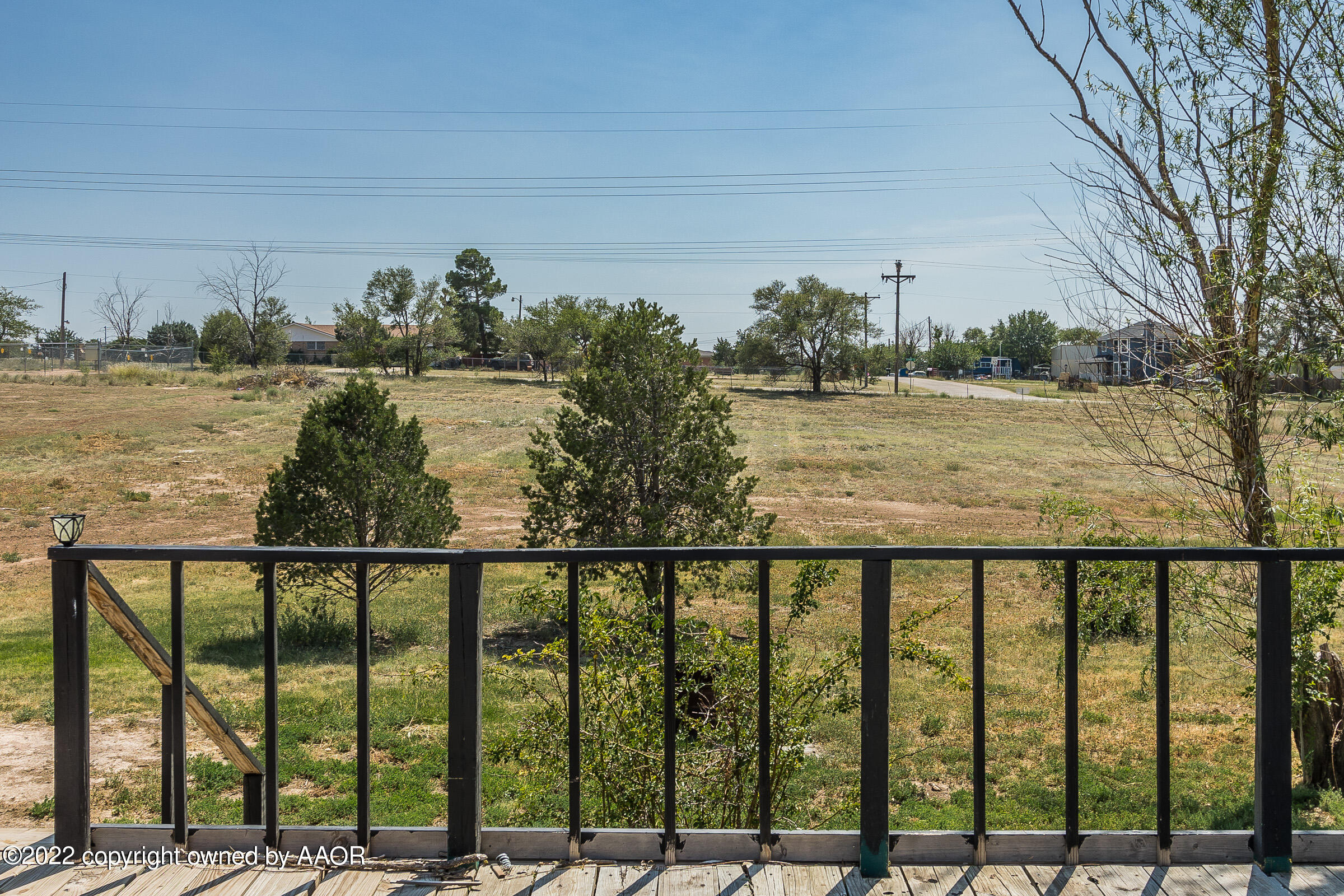 3501 Silver Hill Circle Amarillo, TX 79108 - Photo 24 of 25 a view of a lake from a balcony
