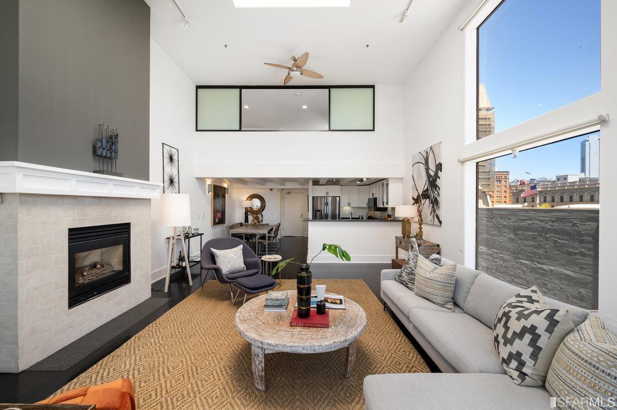 638 Minna, Unit 7 San Francisco, CA 94103 - Photo 11 of 57 a living room with furniture and a fireplace