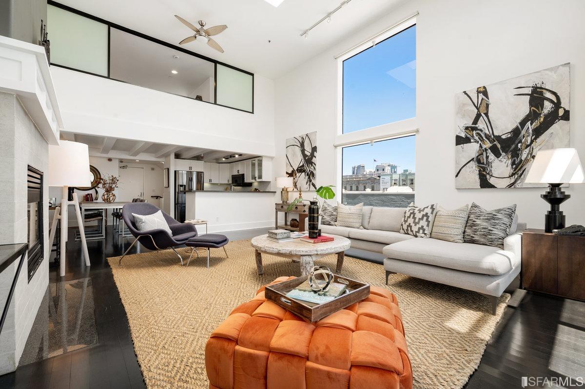638 Minna, Unit 7 San Francisco, CA 94103 - Photo 12 of 57 a living room with furniture and wooden floor