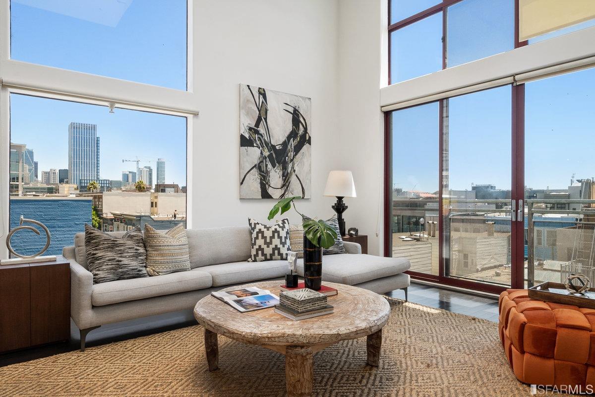 638 Minna, Unit 7 San Francisco, CA 94103 - Photo 14 of 57 a living room with furniture and floor to ceiling windows