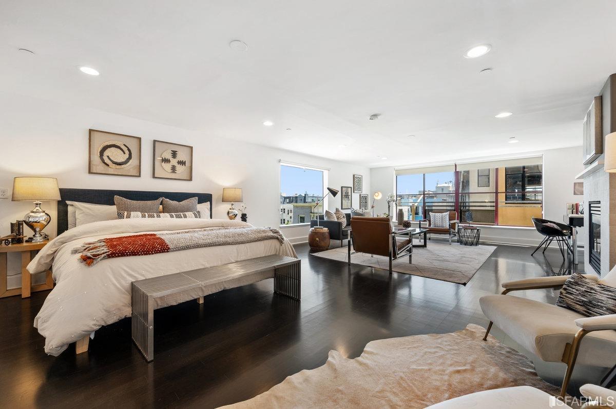 638 Minna, Unit 7 San Francisco, CA 94103 - Photo 27 of 57 a bedroom with furniture and a couch