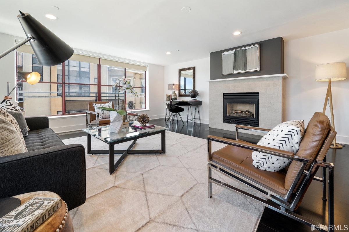638 Minna, Unit 7 San Francisco, CA 94103 - Photo 30 of 57 a living room with furniture and a fireplace