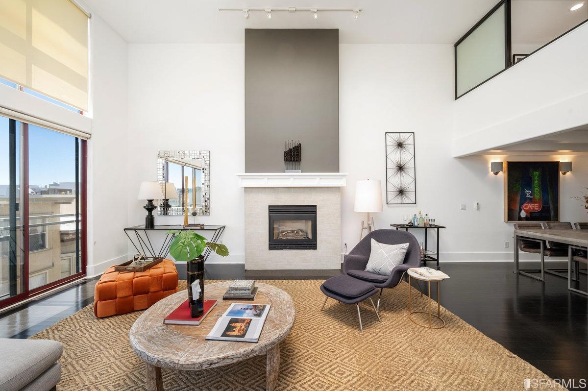 638 Minna, Unit 7 San Francisco, CA 94103 - Photo 3 of 57 a living room with furniture and a fireplace