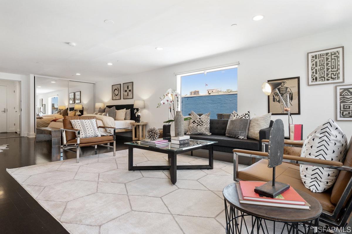 638 Minna, Unit 7 San Francisco, CA 94103 - Photo 35 of 57 a living room with furniture a rug and a table