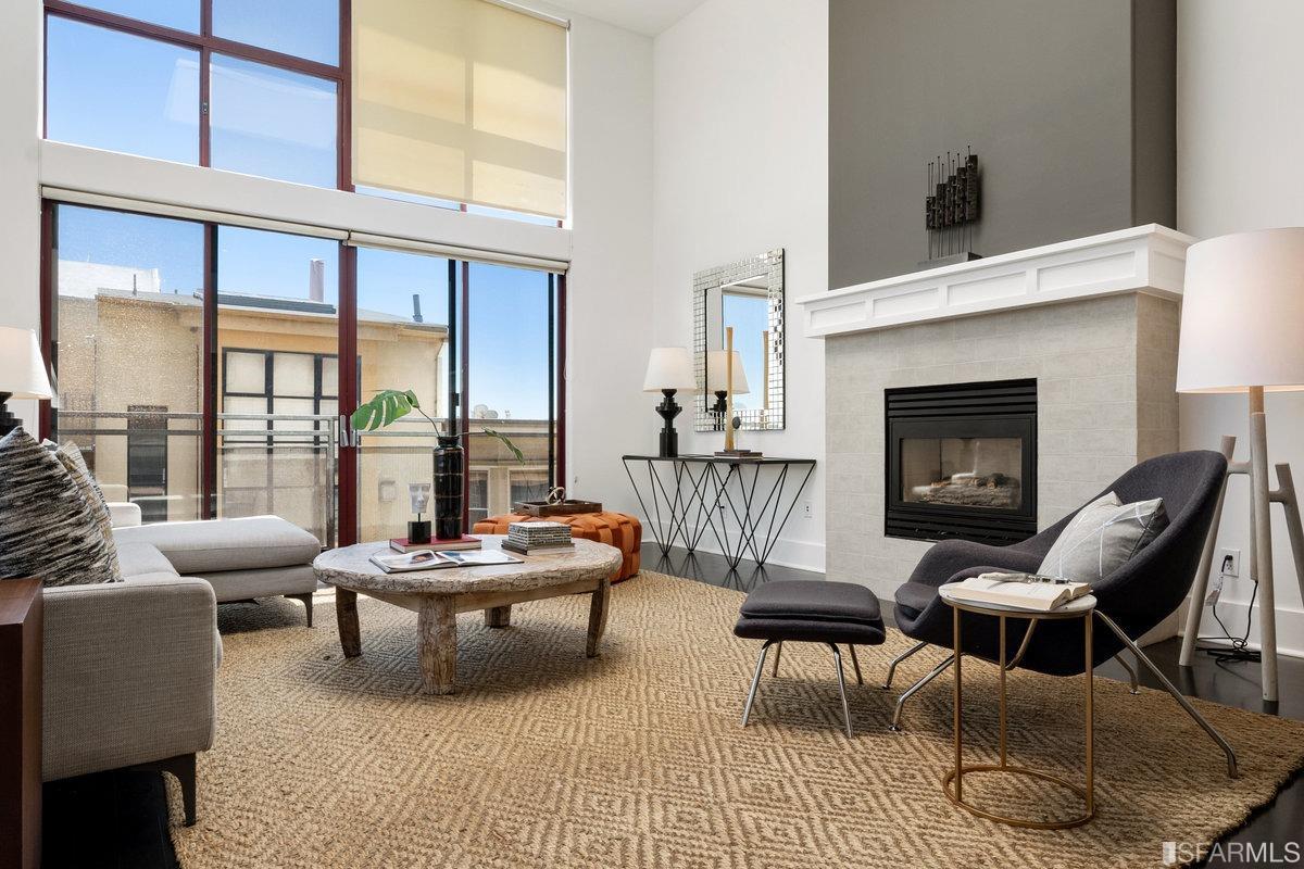 638 Minna, Unit 7 San Francisco, CA 94103 - Photo 4 of 57 a living room with furniture and a fireplace