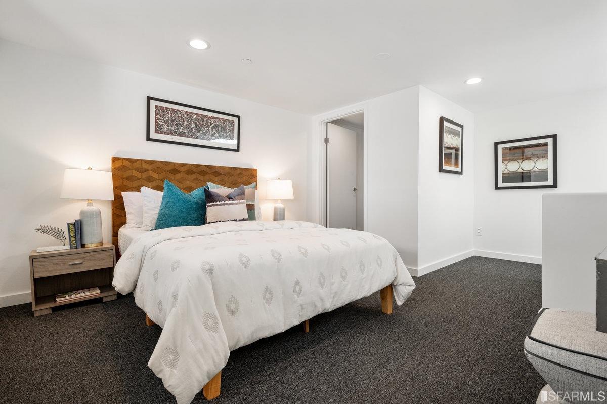 638 Minna, Unit 7 San Francisco, CA 94103 - Photo 45 of 57 a bedroom with a bed and painting on the wall
