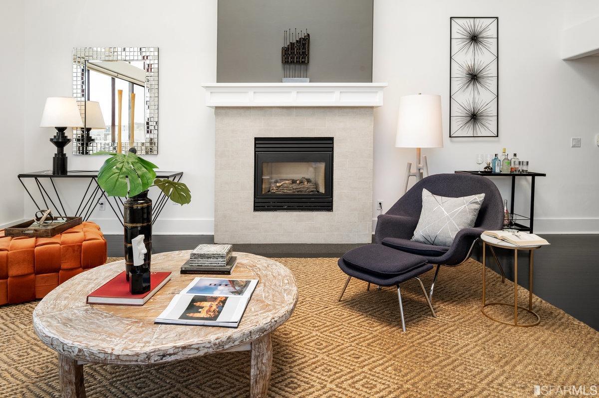 638 Minna, Unit 7 San Francisco, CA 94103 - Photo 6 of 57 a living room with furniture and a fireplace