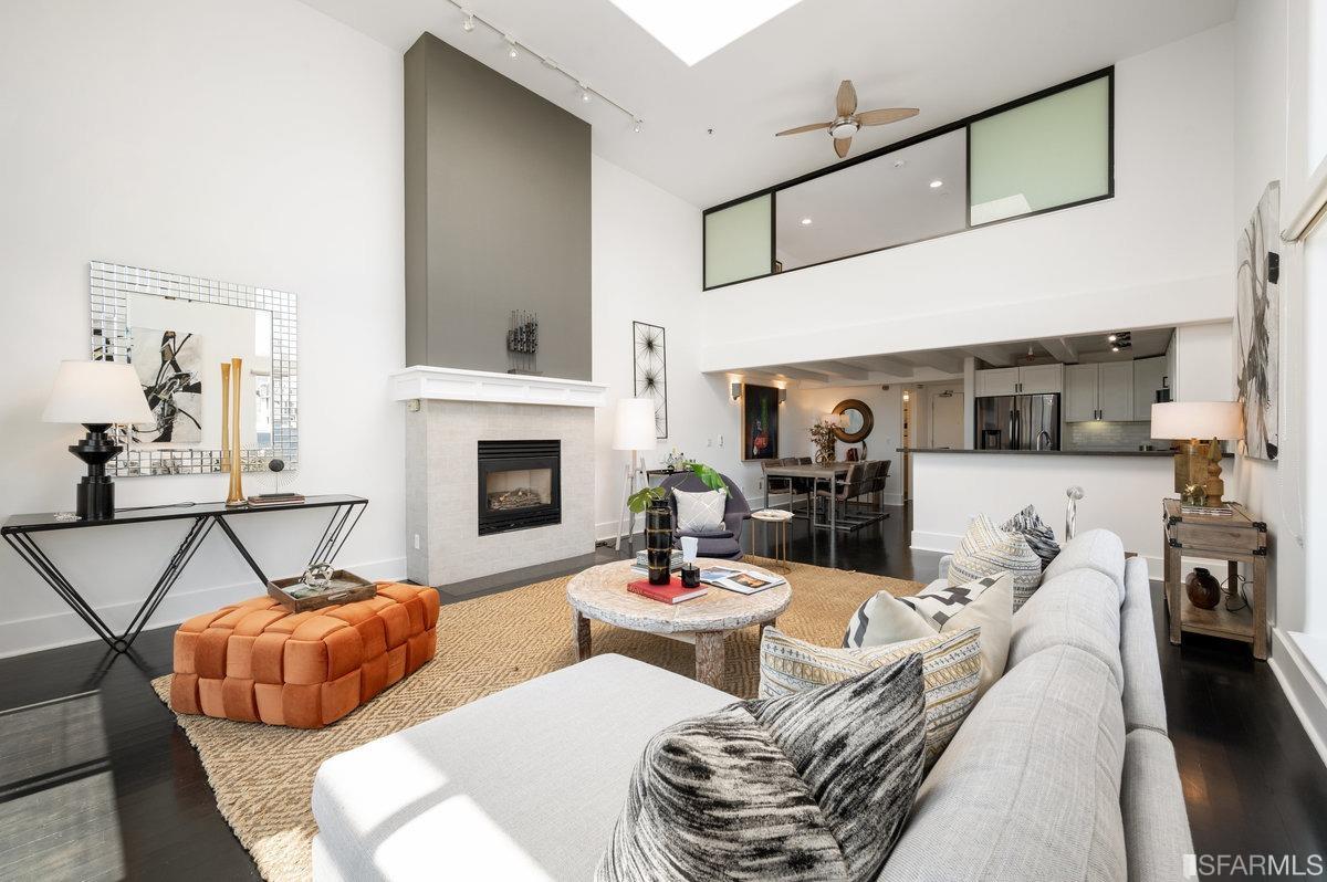 638 Minna, Unit 7 San Francisco, CA 94103 - Photo 10 of 57 a living room with furniture and a fireplace