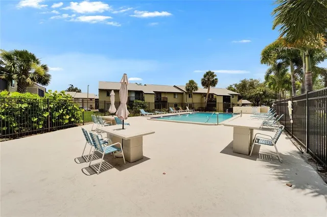 a view of outdoor space and swimming pool
