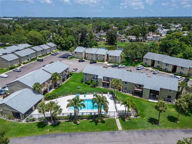 an aerial view of a house with a garden view