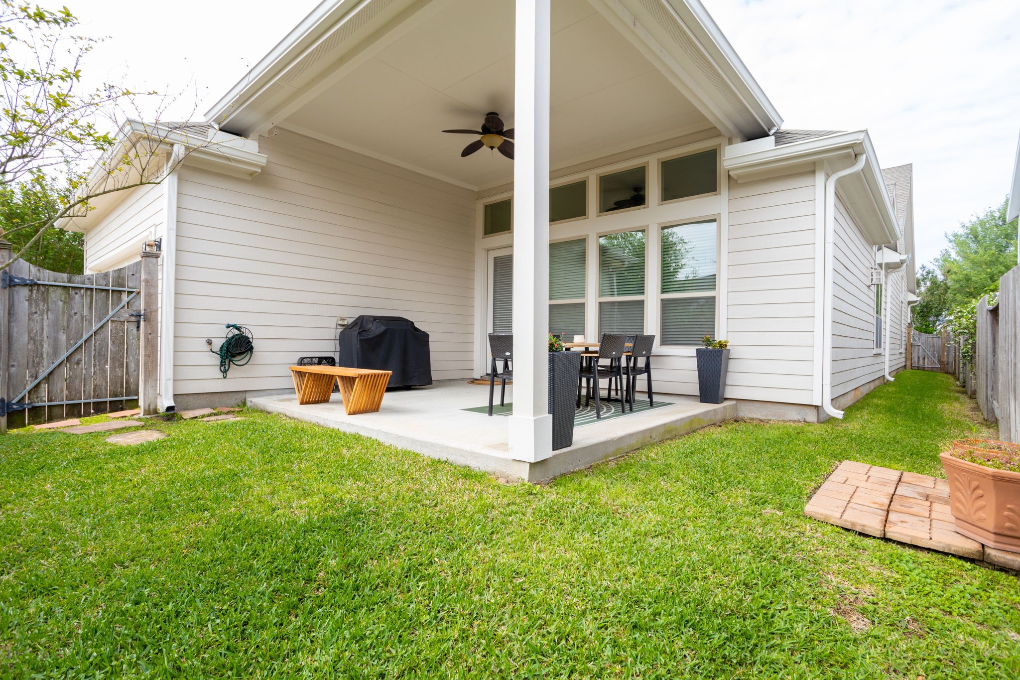 16650 Seminole Ridge Drive Cypress, TX 77433 - Photo 24 of 27 a house view with a sitting space and garden