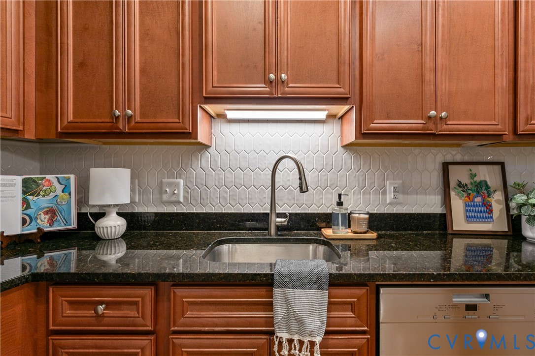 601 Roseneath Road, Unit U1 Richmond, VA 23221 - Photo 18 of 36 Kitchen featuring wood cabinetry, dark speckled co